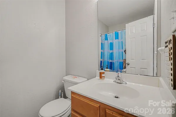 a front view of house with yard and outdoor seating