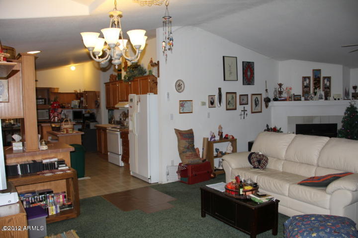 244 South Night View Road Maricopa, AZ 85139 - Photo 5 of 17 living room kitchen view