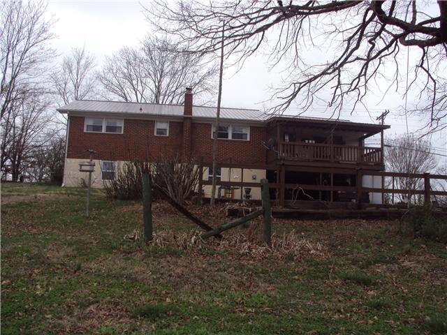 1838 Clydeton Road Waverly, TN 37185 - Photo 3 of 9 Walk out basement that could easily be finished and 2 car carport