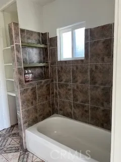 a bathroom with a bathtub