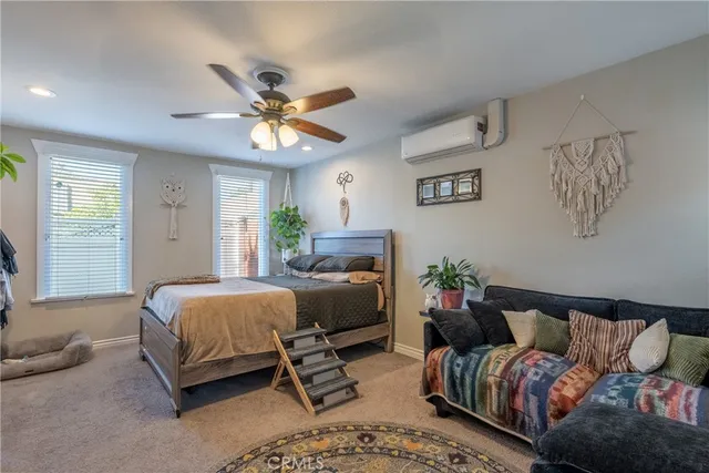 a kitchen with granite countertop a sink stainless steel appliances and cabinets