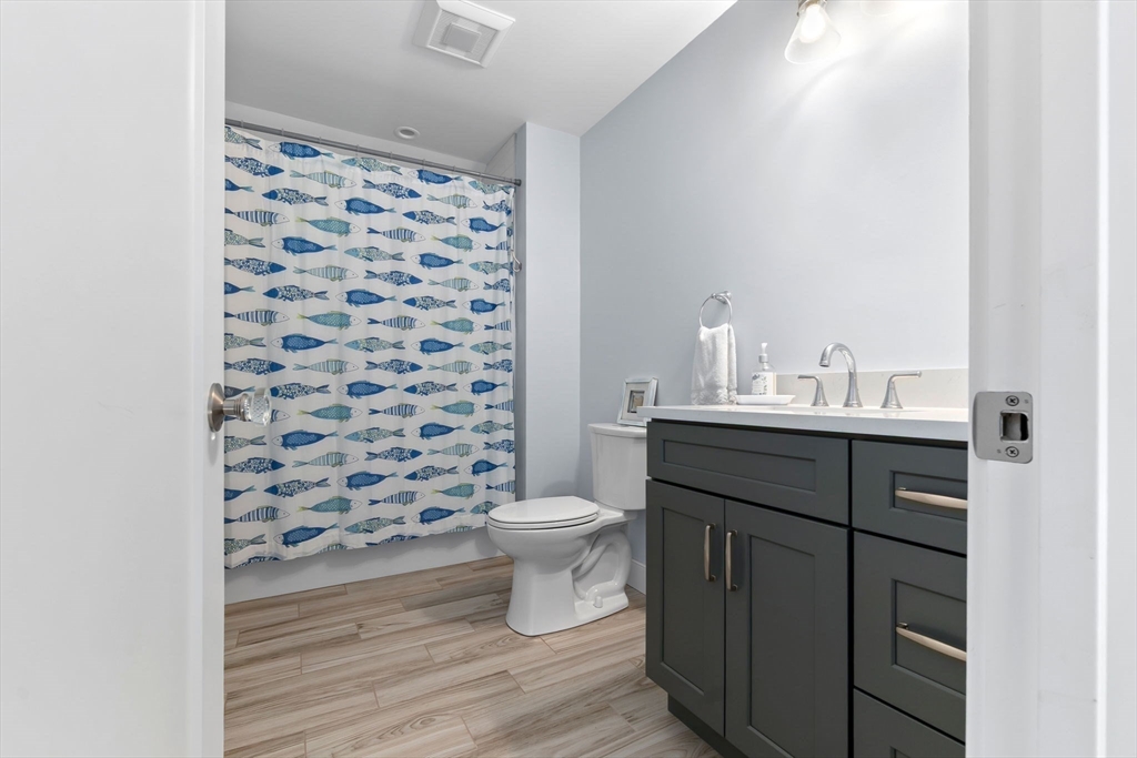 18 Primrose Lane, Unit 18 Ipswich, MA 01938 - Photo 31 of 39 a bathroom with a sink toilet and shower