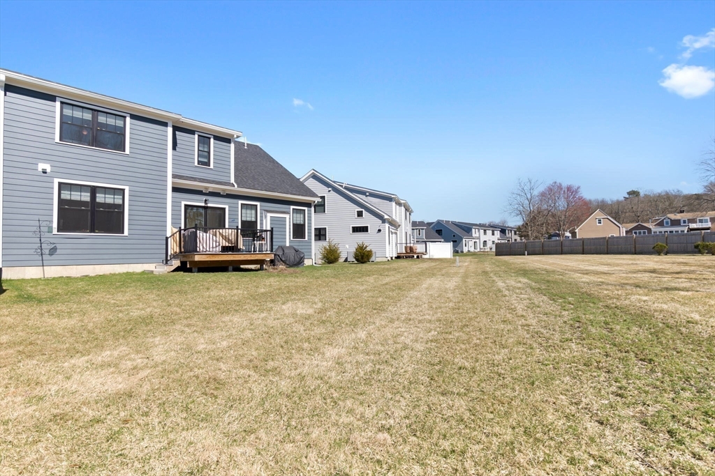 18 Primrose Lane, Unit 18 Ipswich, MA 01938 - Photo 37 of 39 a house view with a swimming pool