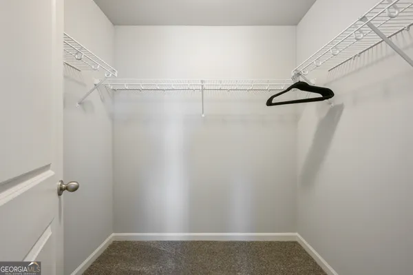 a view of small space with racks on the wall