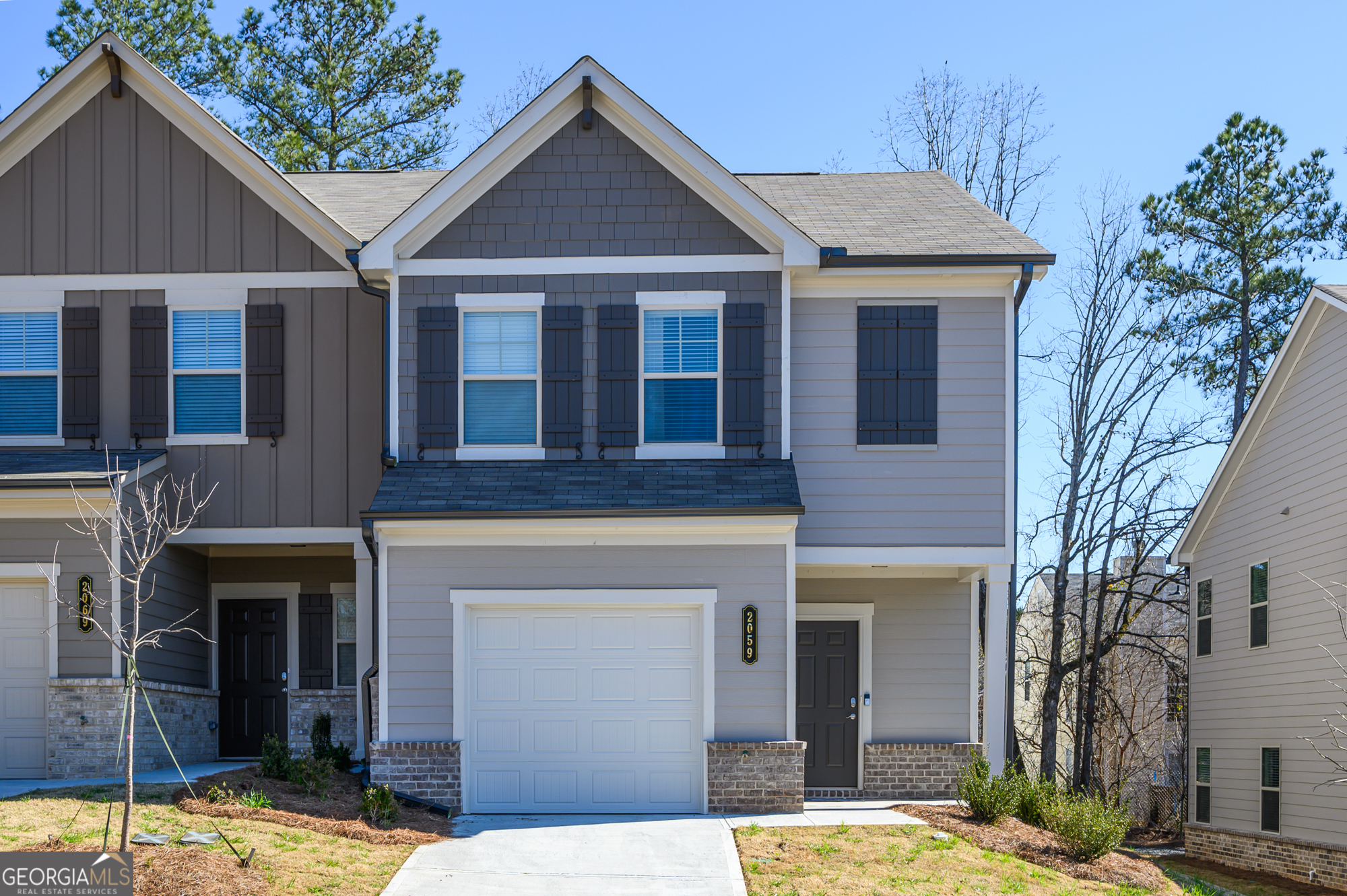 2059 Pinnacle Walk Norcross, GA 30071 - Photo 27 of 27 a front view of a house with a yard