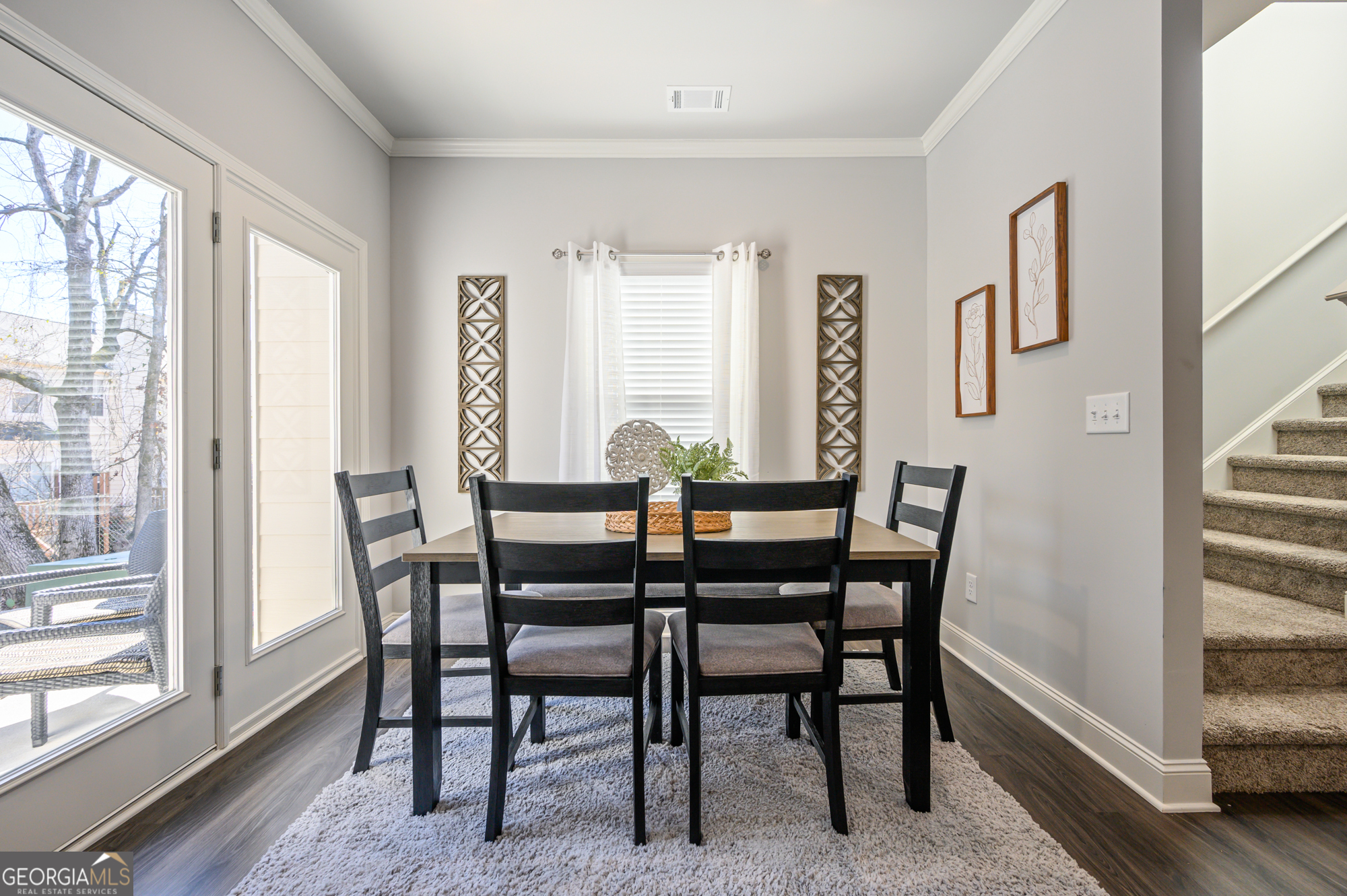 2059 Pinnacle Walk Norcross, GA 30071 - Photo 4 of 27 a view of a dining room with furniture and a large window