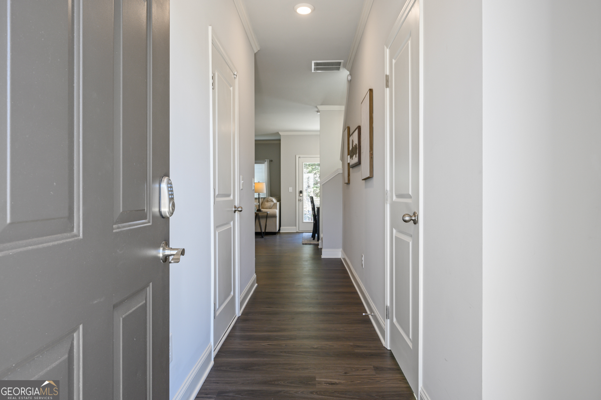 2059 Pinnacle Walk Norcross, GA 30071 - Photo 5 of 27 a view of a hallway with a wooden floor