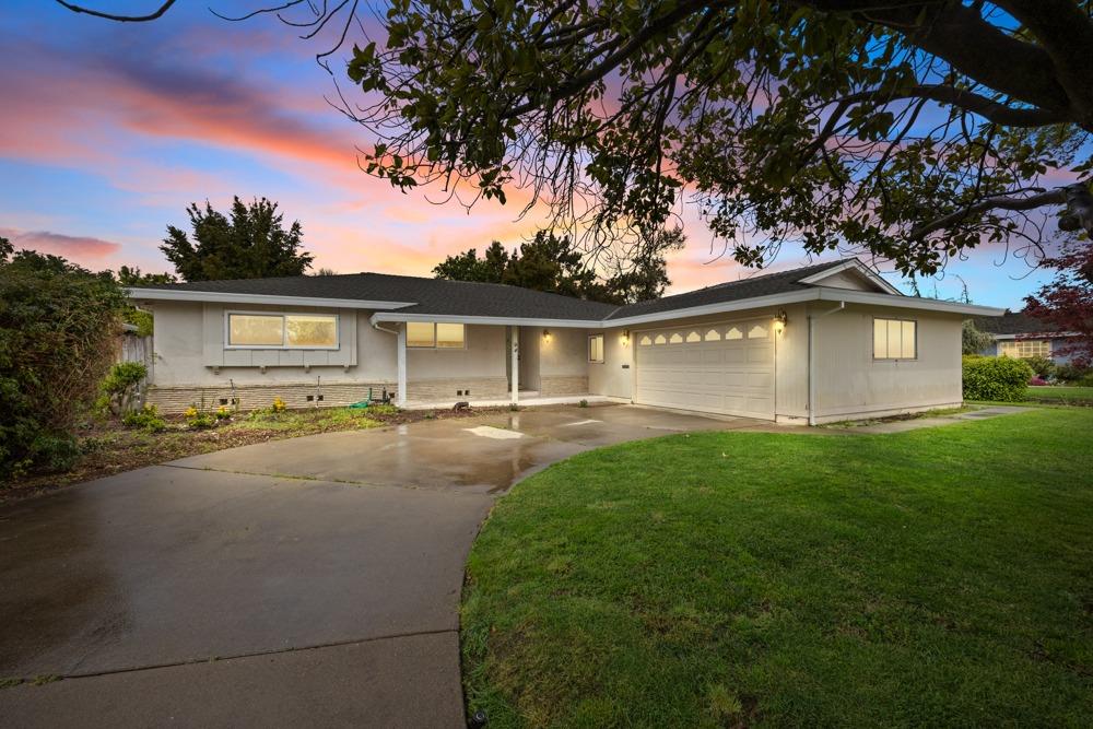 9 Lakeshore Circle Sacramento, CA 95831 - Photo 1 of 1 a front view of a house with a yard and garage