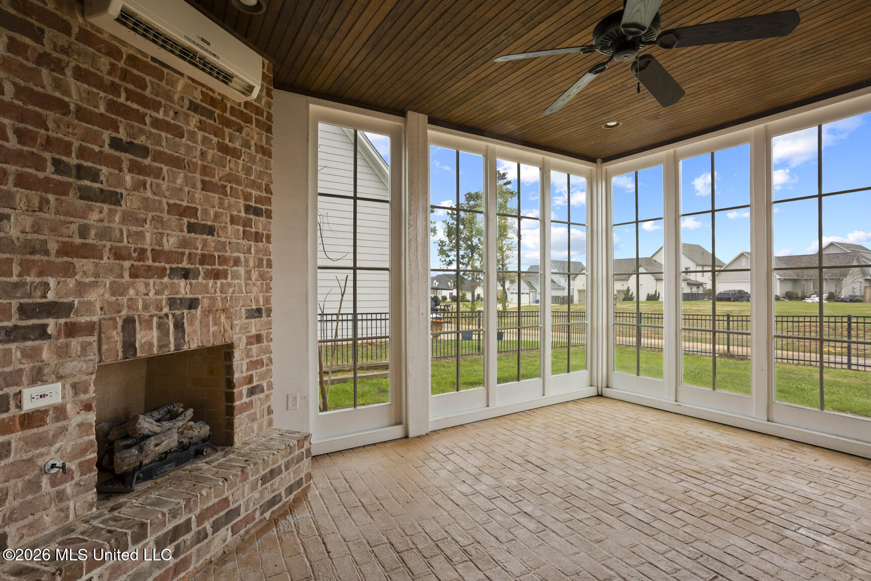 606 Arbor Way Brandon, MS 39047 - Photo 25 of 63 Porch w/ F/P and Mini split off Bar Area
