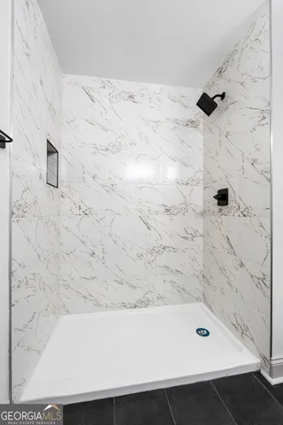 a bathroom with a bathtub