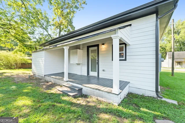 a view of a backyard with a garden