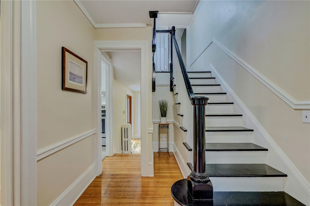 432 Penfield Road Brighton, NY 14625 - Photo 29 of 50 HANDSOME STAIRCASE IN THE FRONT FOYER . . .