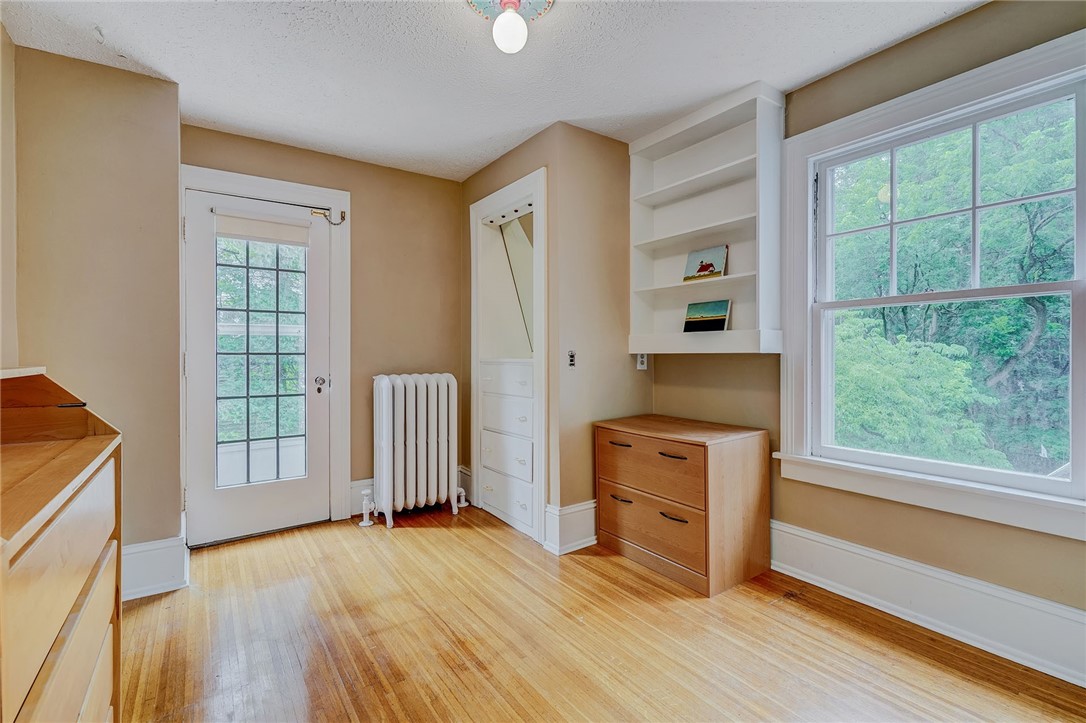 432 Penfield Road Brighton, NY 14625 - Photo 35 of 50 BEDROOM # 3 . . . BEAUTIFUL HARDWOODS . . . DOOR