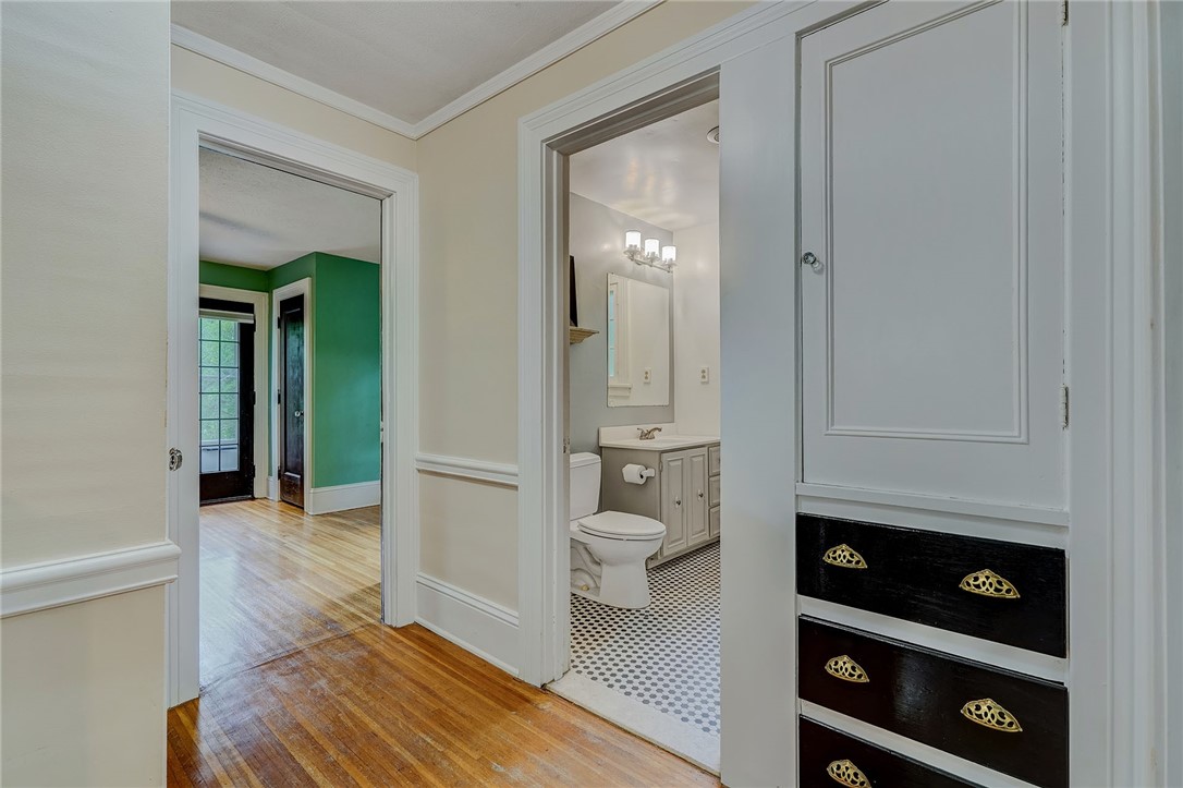 432 Penfield Road Brighton, NY 14625 - Photo 39 of 50 HALLWAY WITH BUILT-INS . . . VIEW TO THE MAIN BATH