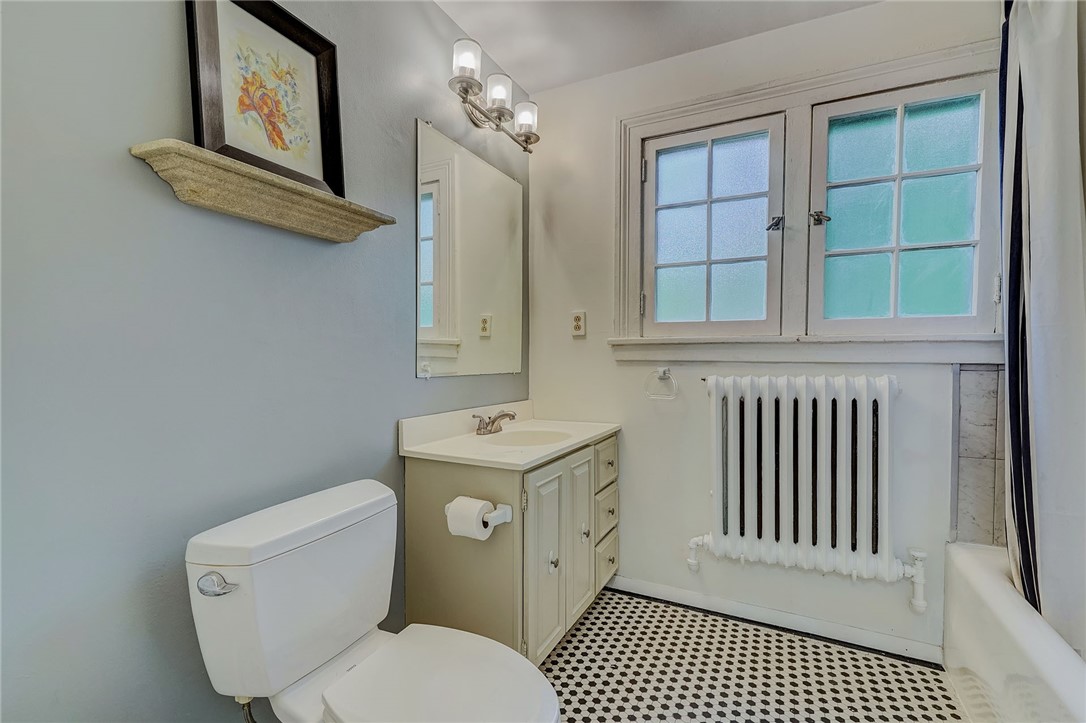 432 Penfield Road Brighton, NY 14625 - Photo 40 of 50 MAIN BATH WITH TILE FLOORING . . . UPDATED VANITY
