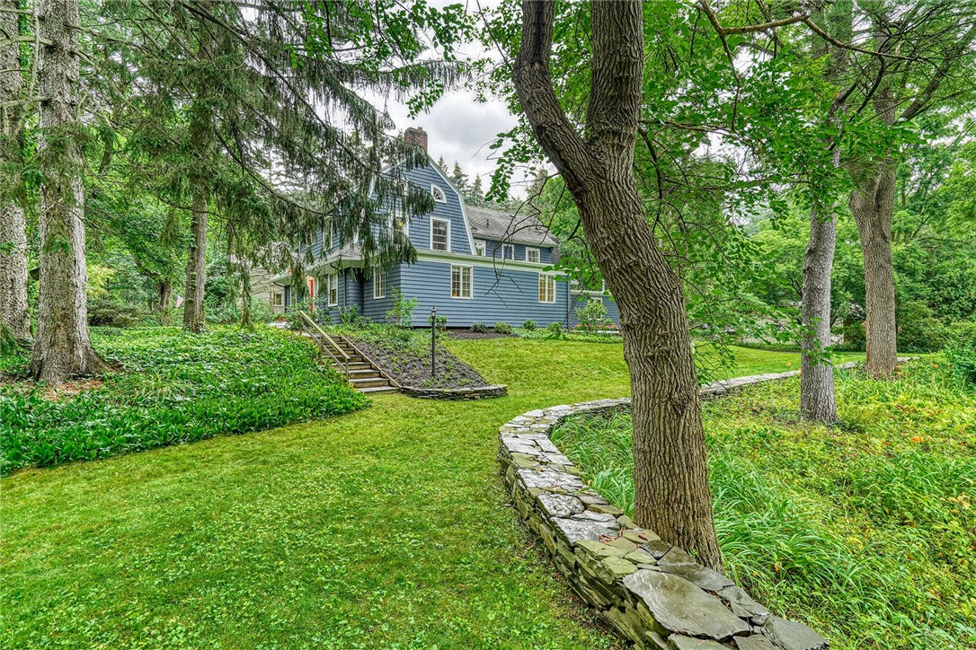 432 Penfield Road Brighton, NY 14625 - Photo 4 of 50 LUSH LANDSCAPE . . . AMAZING STONE WALL BORDER