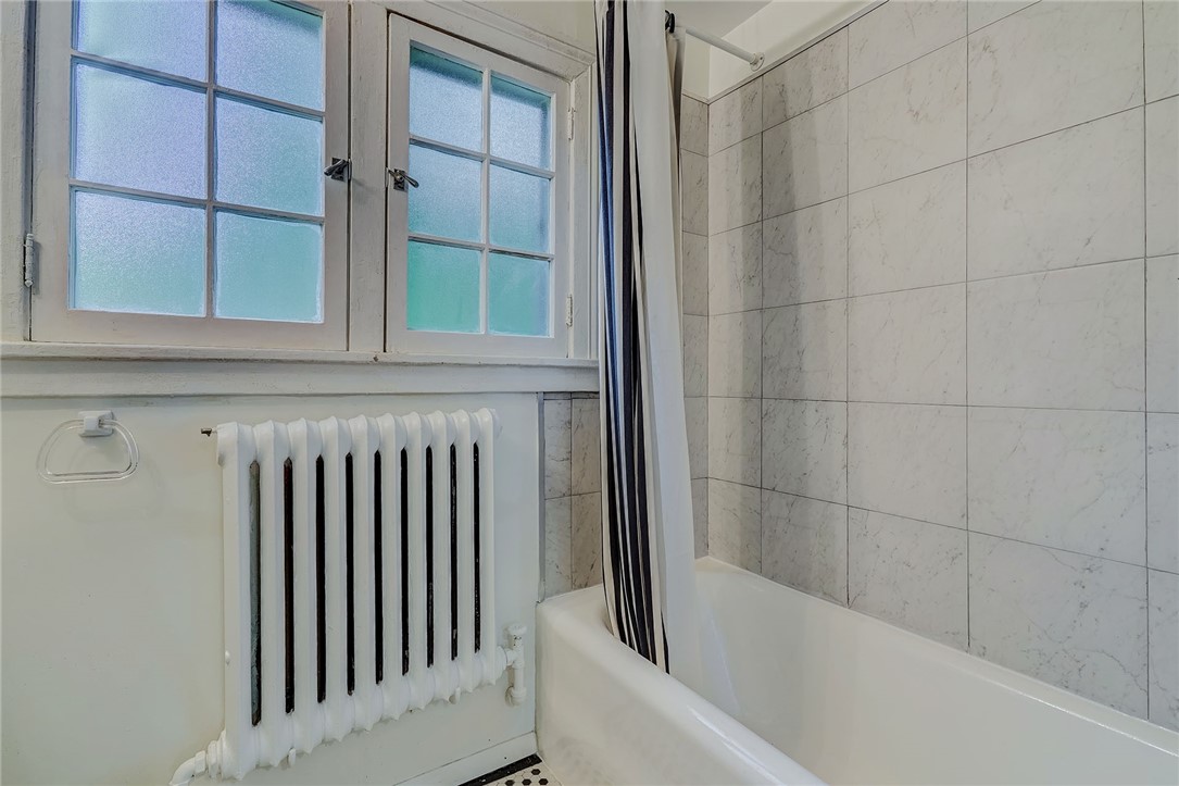 432 Penfield Road Brighton, NY 14625 - Photo 41 of 50 MAIN BATH . . . . TUB WITH TILE SURROUND
