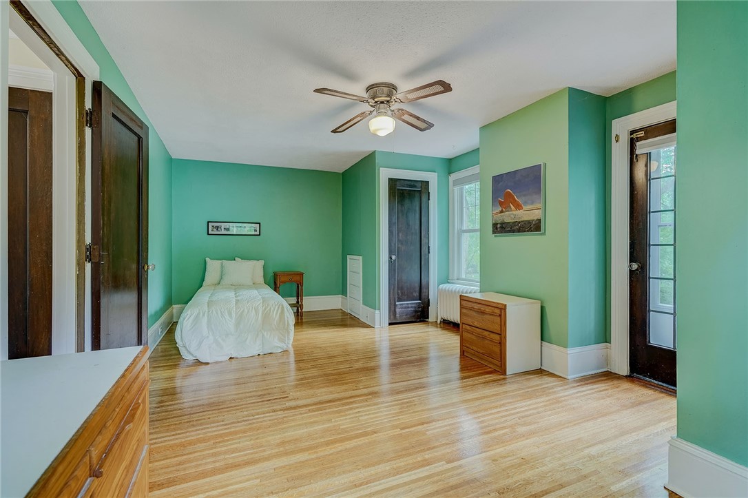 432 Penfield Road Brighton, NY 14625 - Photo 43 of 50 BEDROOM # 5 . . .DOOR TO ROOFTOP SUNPORCH!