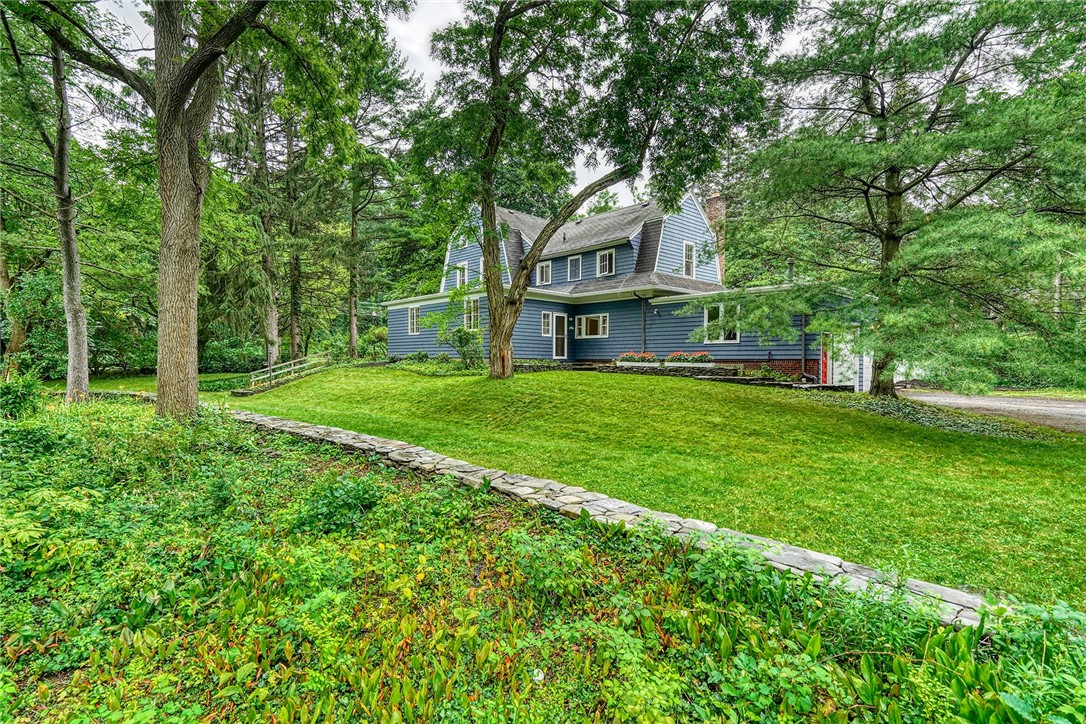 432 Penfield Road Brighton, NY 14625 - Photo 6 of 50 MORE OF THE STONE WALL BORDER . . REAR ENTRANCE T