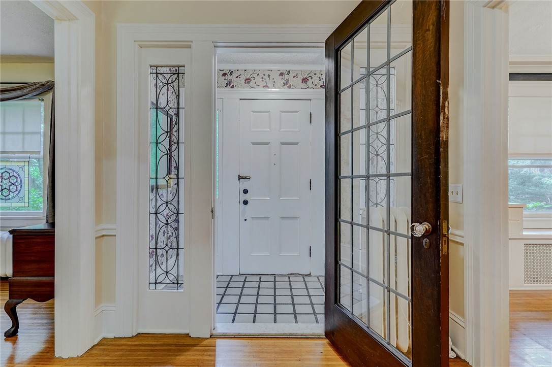 432 Penfield Road Brighton, NY 14625 - Photo 8 of 50 IMPRESSIVE FRONT ENTRY/FOYER . . .LEADED GLASS . .
