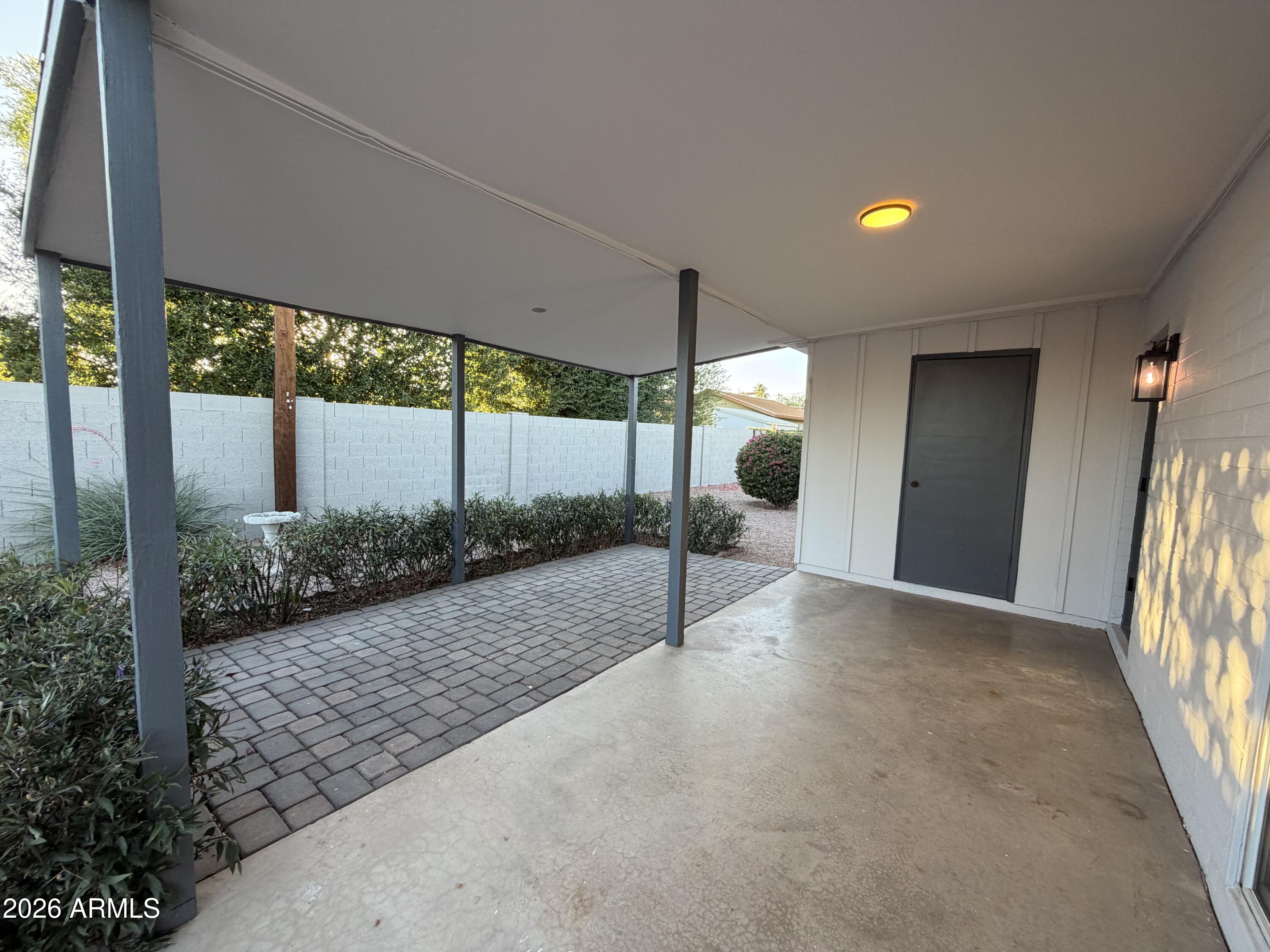 5420 North Granite Reef Road Scottsdale, AZ 85250 - Photo 24 of 30 a view of a porch
