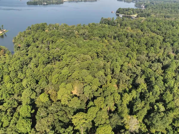 a view of a lake with a big yard