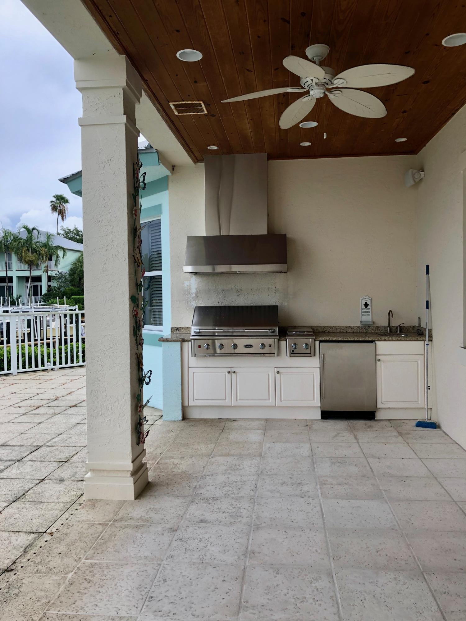 556 Southwest St Lucie Crescent Stuart, FL 34994 - Photo 34 of 42 Summer Kitchen