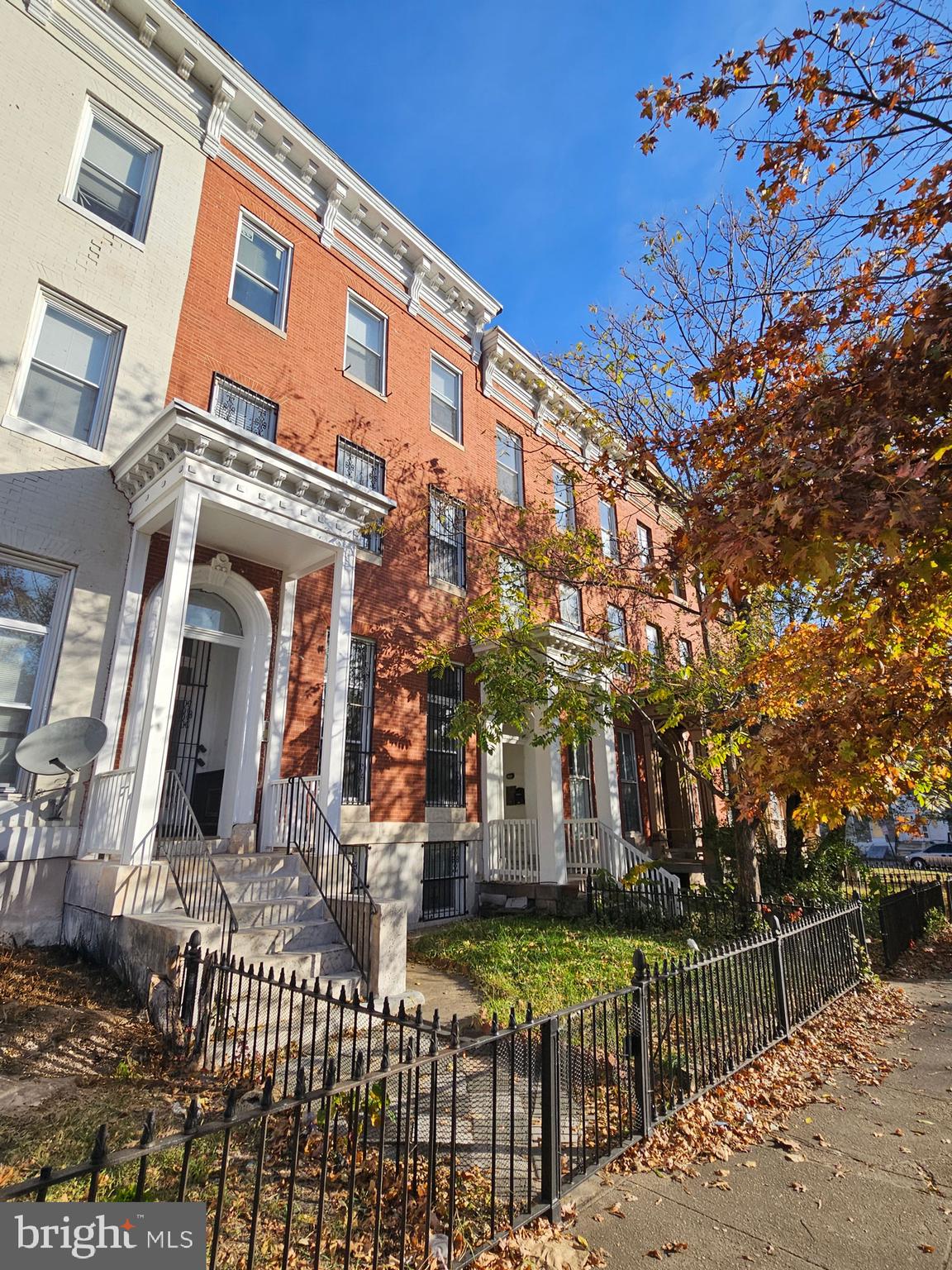1308 West Lexington Street, Unit 2R Baltimore, MD 21223 - Photo 3 of 12 a front view of a house with a tree