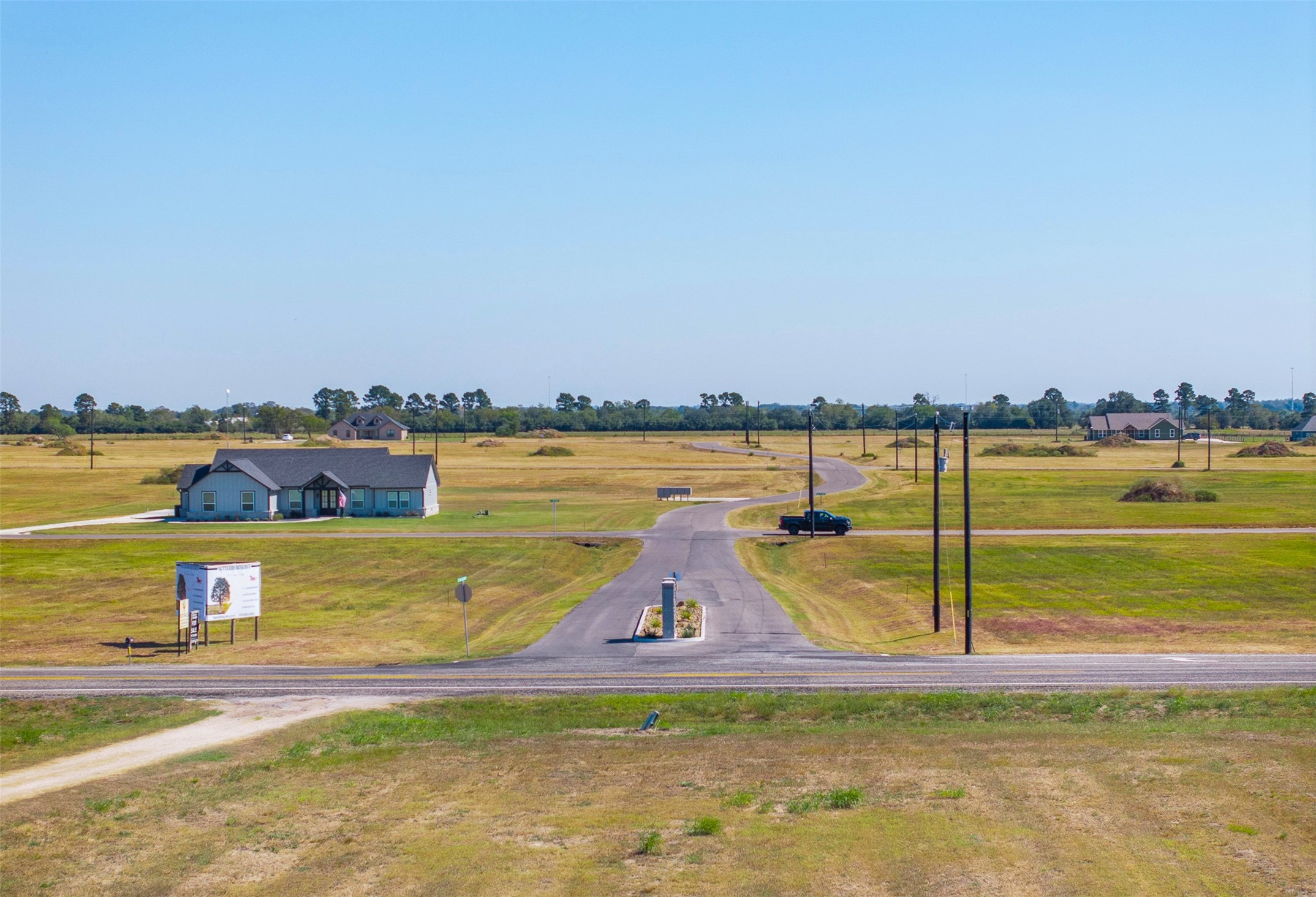 269 El Dorado Court Cat Spring, TX 78933 - Photo 4 of 29 a view of a city with lawn chairs