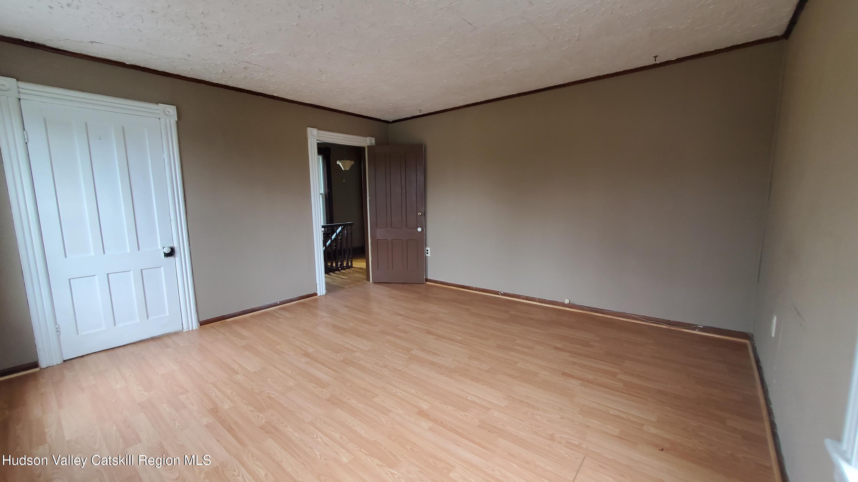 102 2nd Street Athens, NY 12015 - Photo 15 of 19 a view of an empty room with wooden floor
