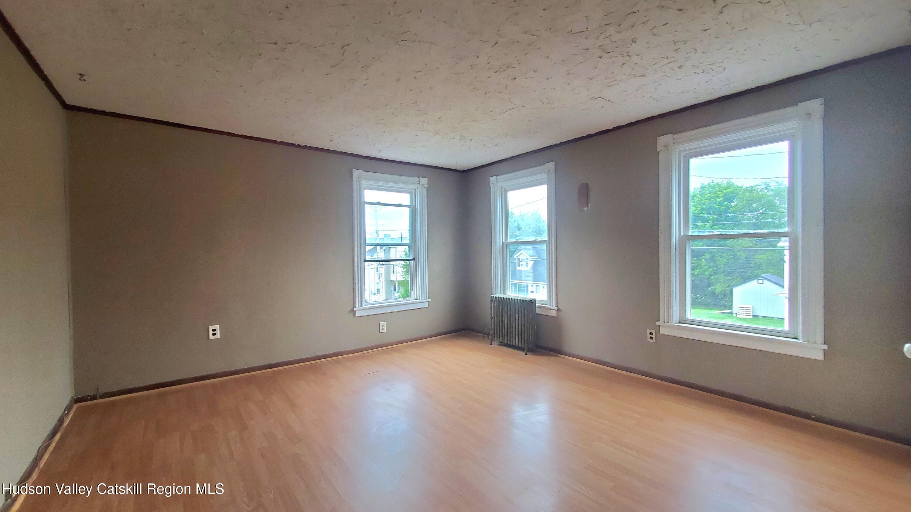 102 2nd Street Athens, NY 12015 - Photo 16 of 19 a view of an empty room with a window