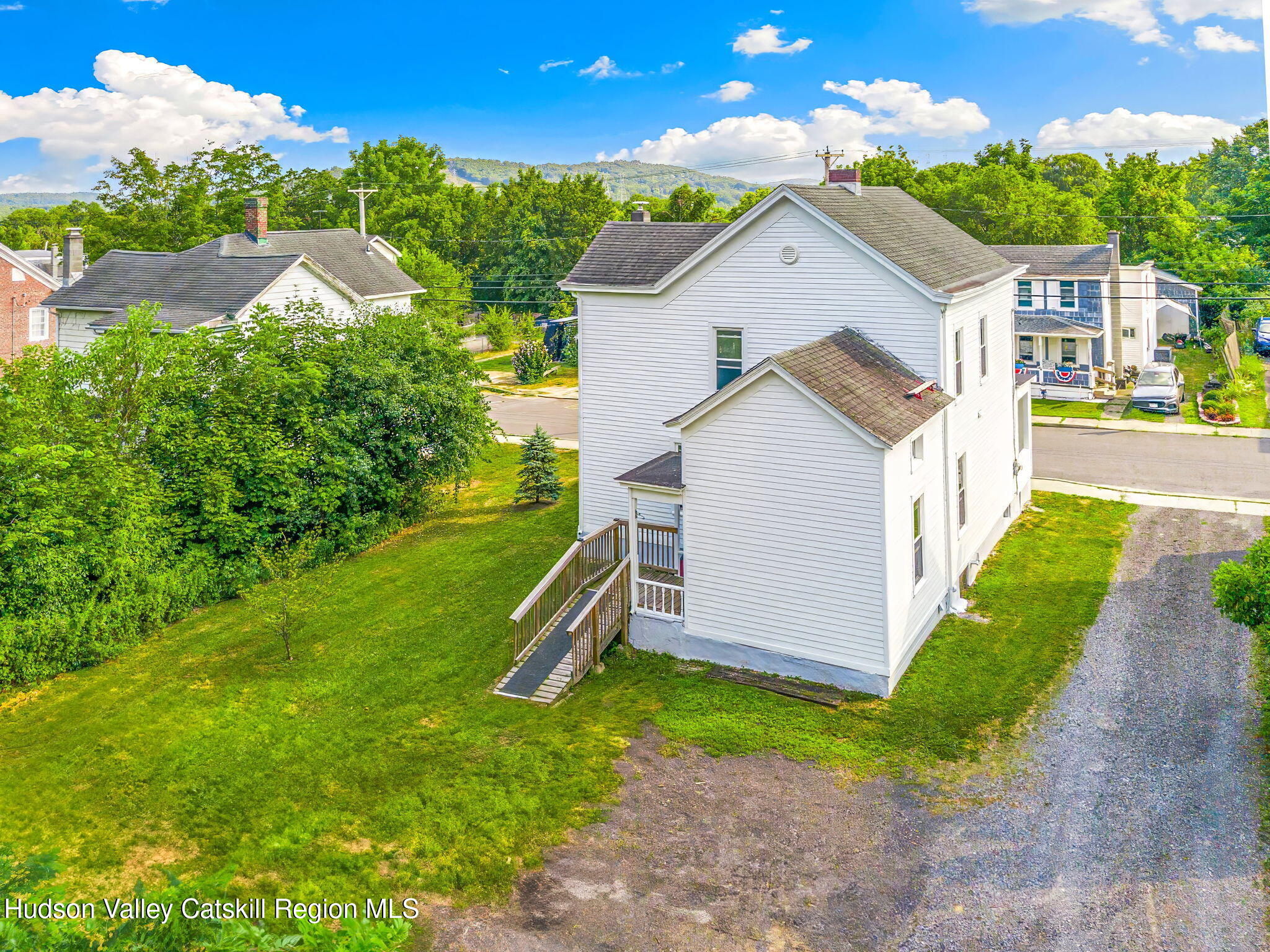 102 2nd Street Athens, NY 12015 - Photo 3 of 19 a view of a house with a yard and sitting area