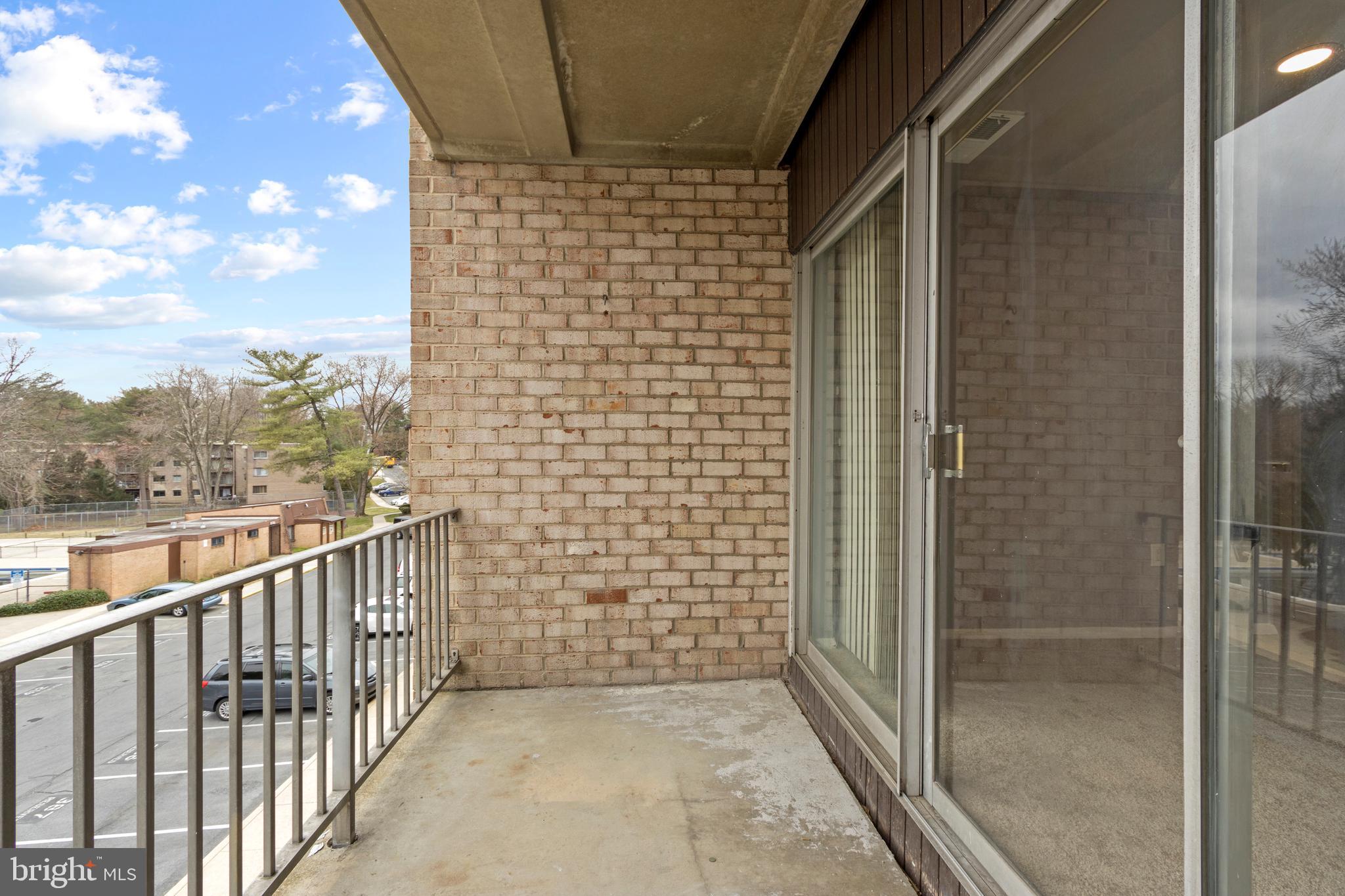 3742 Bel Pre Road, Unit 10 Silver Spring, MD 20906 - Photo 11 of 31 Balcony off Dining Room