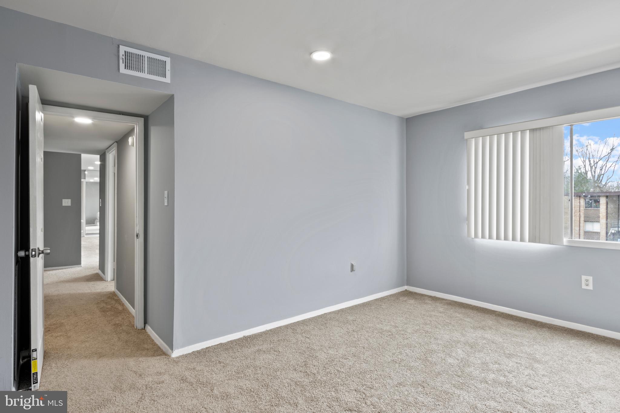 3742 Bel Pre Road, Unit 10 Silver Spring, MD 20906 - Photo 26 of 31 Master Bedroom