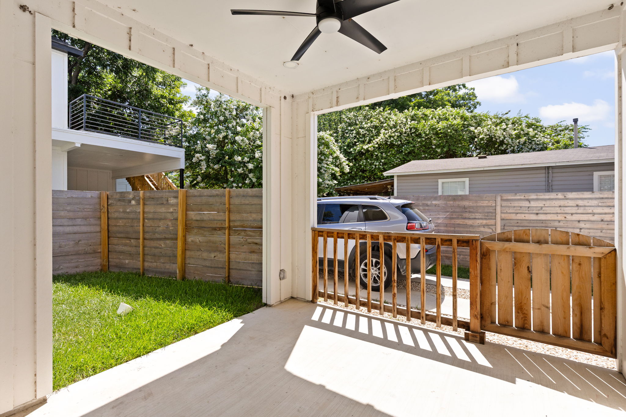 2717 Lyons Road, Unit 1 Austin, TX 78702 - Photo 16 of 40 An inviting covered patio offers a private outdoor retreat, perfect for enjoying peaceful moments.