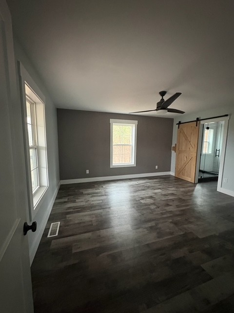 422 Parker Road Portland, TN 37148 - Photo 11 of 21 a view of room with window and wooden floor