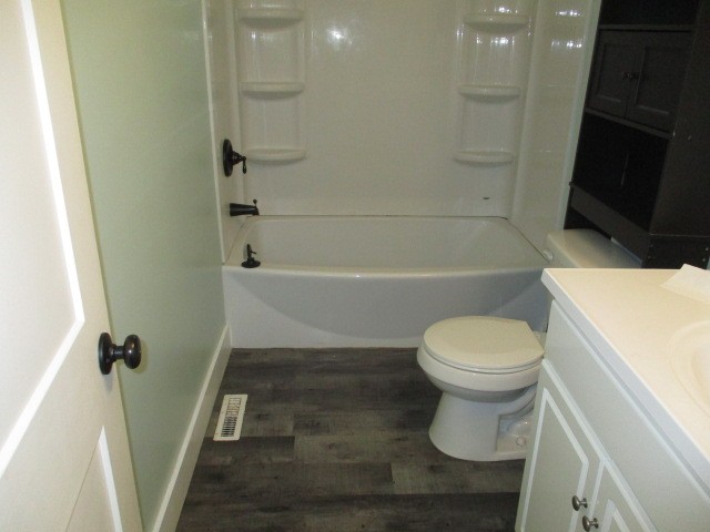 422 Parker Road Portland, TN 37148 - Photo 13 of 21 a bathroom with a sink a toilet a bathtub and shower
