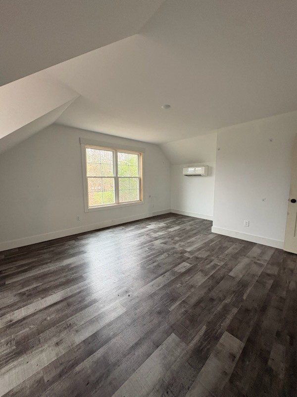 422 Parker Road Portland, TN 37148 - Photo 15 of 21 an empty room with wooden floor and windows