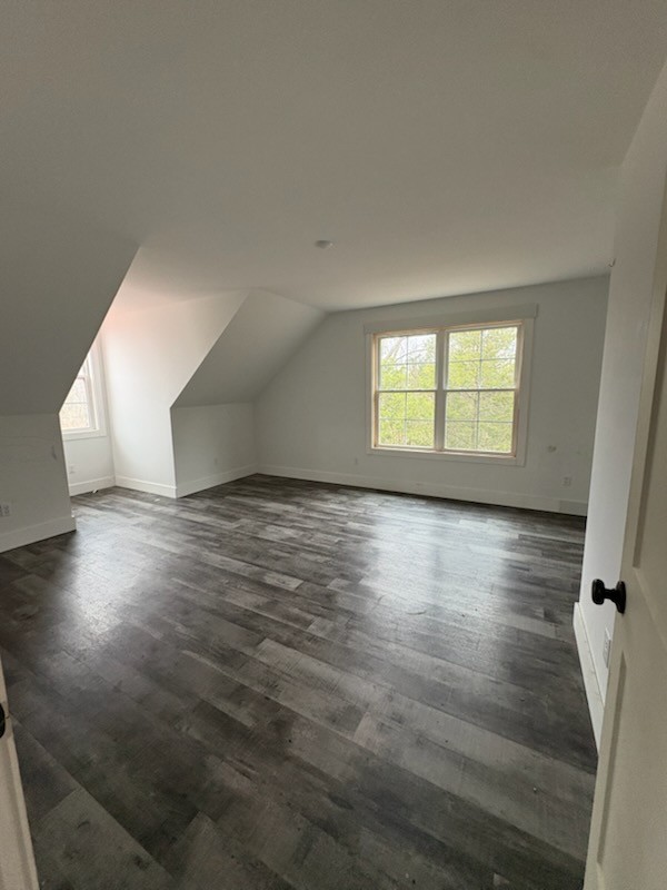 422 Parker Road Portland, TN 37148 - Photo 17 of 21 an empty room with wooden floor and windows