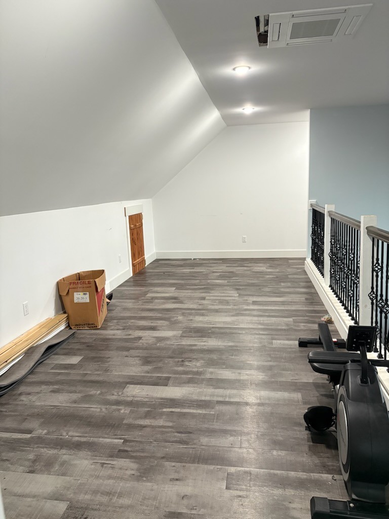 422 Parker Road Portland, TN 37148 - Photo 20 of 21 a view of an empty room with wooden floor