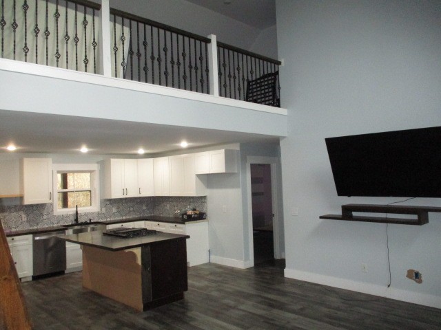 422 Parker Road Portland, TN 37148 - Photo 9 of 21 a kitchen with stainless steel appliances granite countertop a stove and a sink