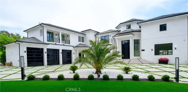 a house view with garden space