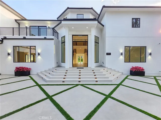 a view of hall way with furniture