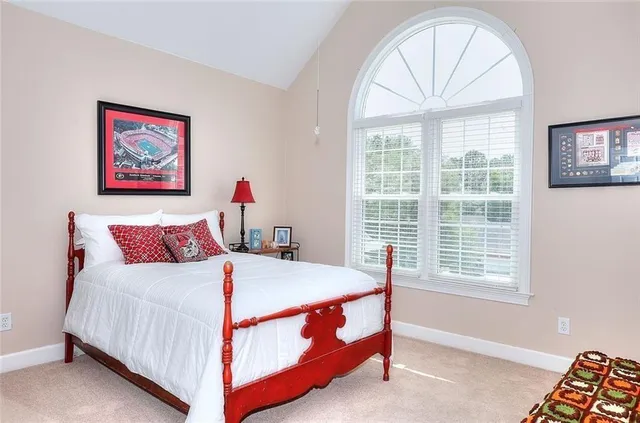 a living room with furniture and white walls
