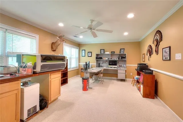 a white toilet sitting next to a bathroom sink