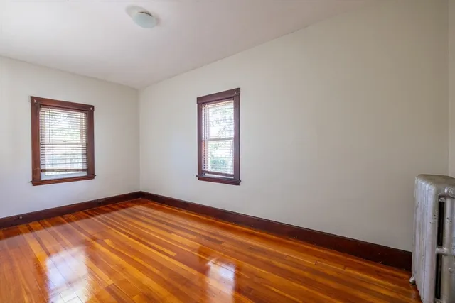 a view of a room with a large window