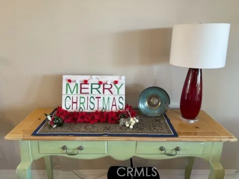 a room with toys and dresser