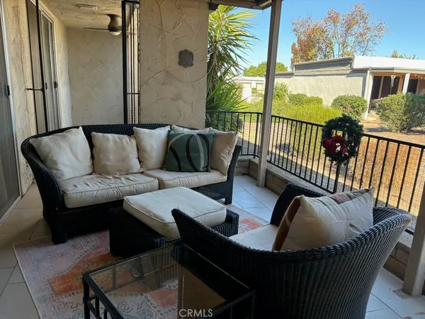 a balcony with furniture
