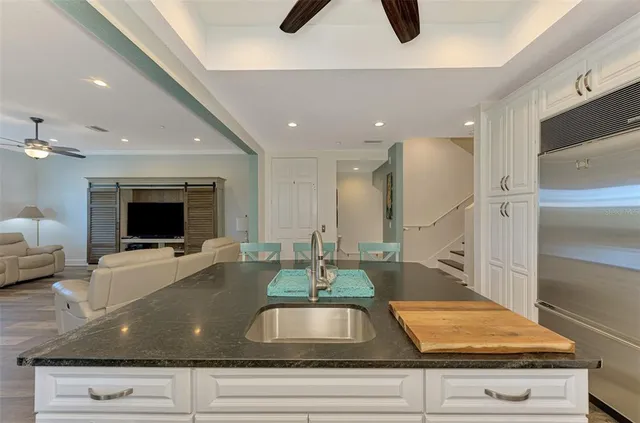 a view of room with window and flat screen tv