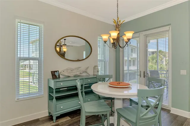 a bedroom with a bed and a table